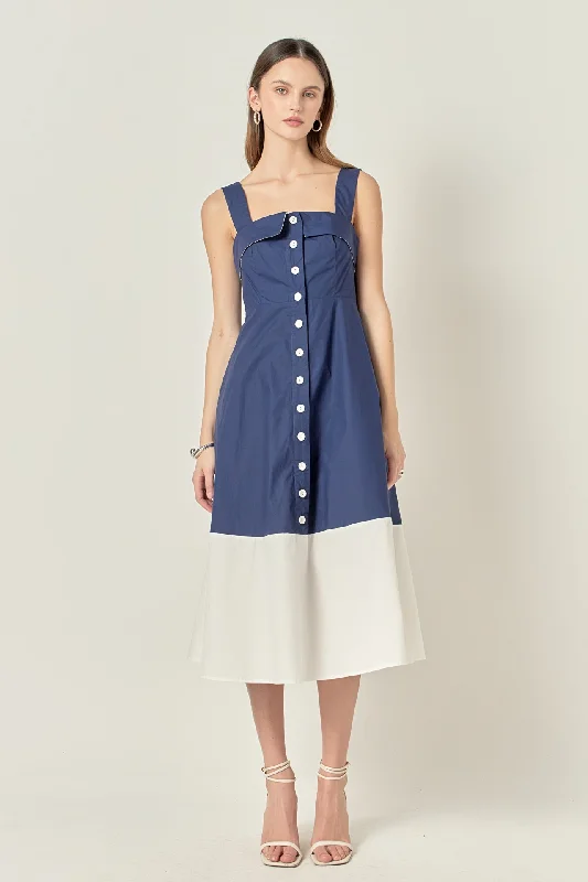 Midi dresses with ruffled sleeves for a more feminine and voluminous look Navy & White Color Block Midi Dress Midi dresses with ruffled sleeves for a more feminine and voluminous look Navy & White Color Block Midi Dress