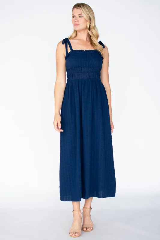 Midi dresses with pom - pom trims for a playful and festive look Gilly Dress