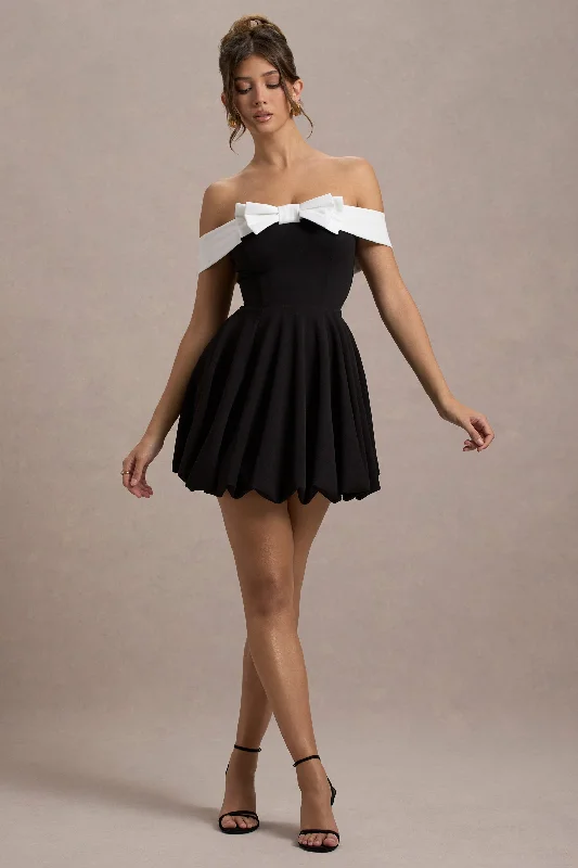 Mini dresses with bow accents for a sweet look Minimoiselle | Black & White Bow Bardot Mini Dress With Puff-Ball Skirt Mini dresses with bow accents for a sweet look Minimoiselle | Black & White Bow Bardot Mini Dress With Puff-Ball Skirt