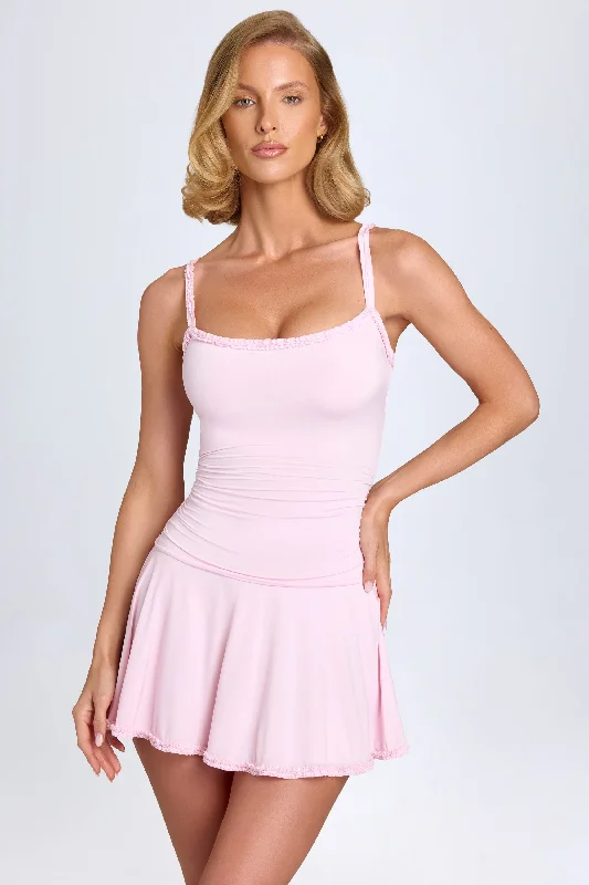 Mini dresses with abstract prints for an artistic look Lace-Trim Ruched Mini Dress in Blush Mini dresses with abstract prints for an artistic look Lace-Trim Ruched Mini Dress in Blush