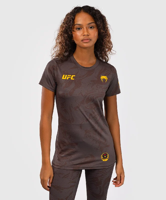 Distressed Women T Shirt with a Laid - Back AestheticUFC Fusion by Venum Fight Week Women’s Dry-Tech T-Shirt - Earthen Brown Distressed Women T Shirt with a Laid - Back AestheticUFC Fusion by Venum Fight Week Women’s Dry-Tech T-Shirt - Earthen Brown