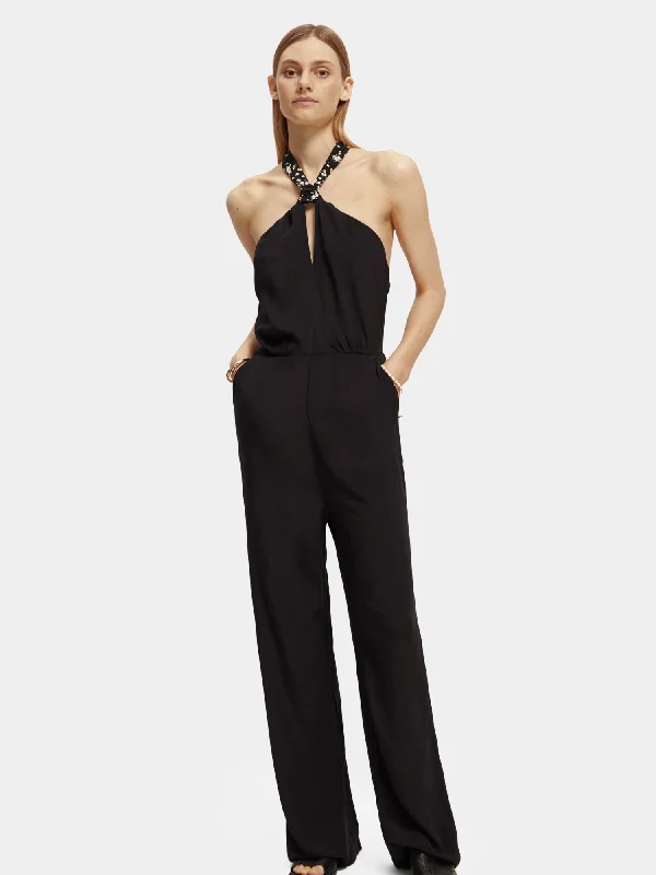 Denim women jumpsuits with ripped details for a casual - edgy lookContrast bow jumpsuit Denim women jumpsuits with ripped details for a casual - edgy lookContrast bow jumpsuit
