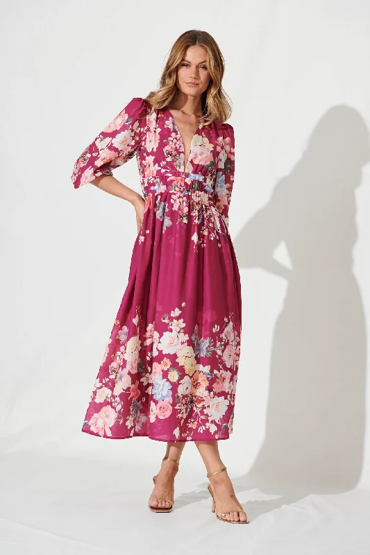 Ruffled maxi dresses with a tiered skirt for added volumeCamie Maxi Dress In Magenta With Blush Floral Ruffled maxi dresses with a tiered skirt for added volumeCamie Maxi Dress In Magenta With Blush Floral