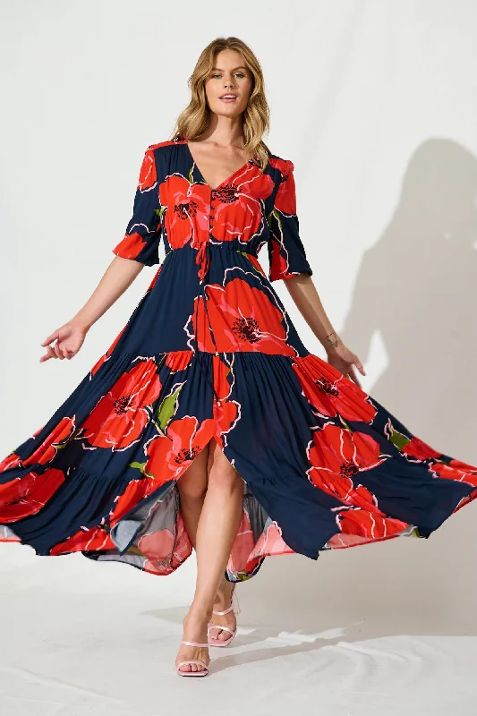 Maxi dresses with tassel accents for a fun and lively touchEmilia Maxi Dress In Navy With Red Floral Maxi dresses with tassel accents for a fun and lively touchEmilia Maxi Dress In Navy With Red Floral