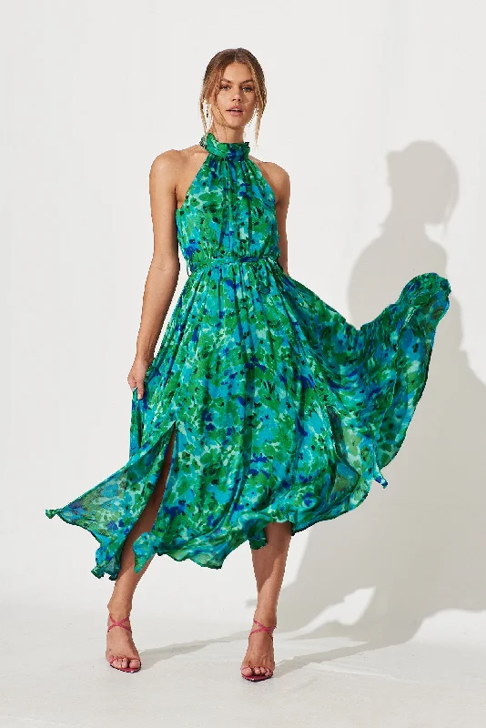 Maxi dresses with a gathered skirt for a voluminous and dramatic effectKiss Me Halter Neck Maxi Dress In Green Watercolour Print Maxi dresses with a gathered skirt for a voluminous and dramatic effectKiss Me Halter Neck Maxi Dress In Green Watercolour Print