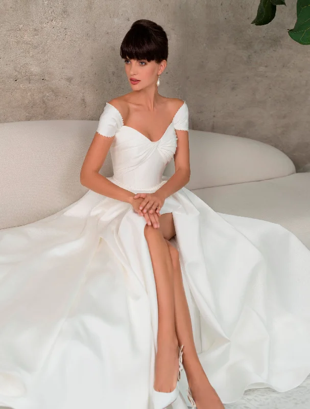Wedding guest dresses with patchwork designs for a unique lookElegant Off-Shoulder Wedding Gown Wedding guest dresses with patchwork designs for a unique lookElegant Off-Shoulder Wedding Gown