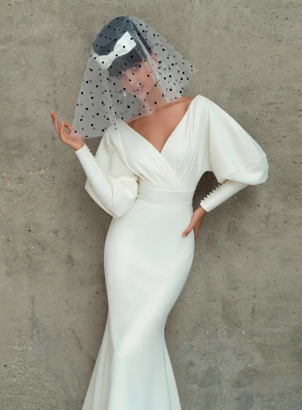 Wedding guest dresses with patchwork designs for a unique lookJuliet Sleeve Mermaid Minimalist Wedding Gown Wedding guest dresses with patchwork designs for a unique lookJuliet Sleeve Mermaid Minimalist Wedding Gown