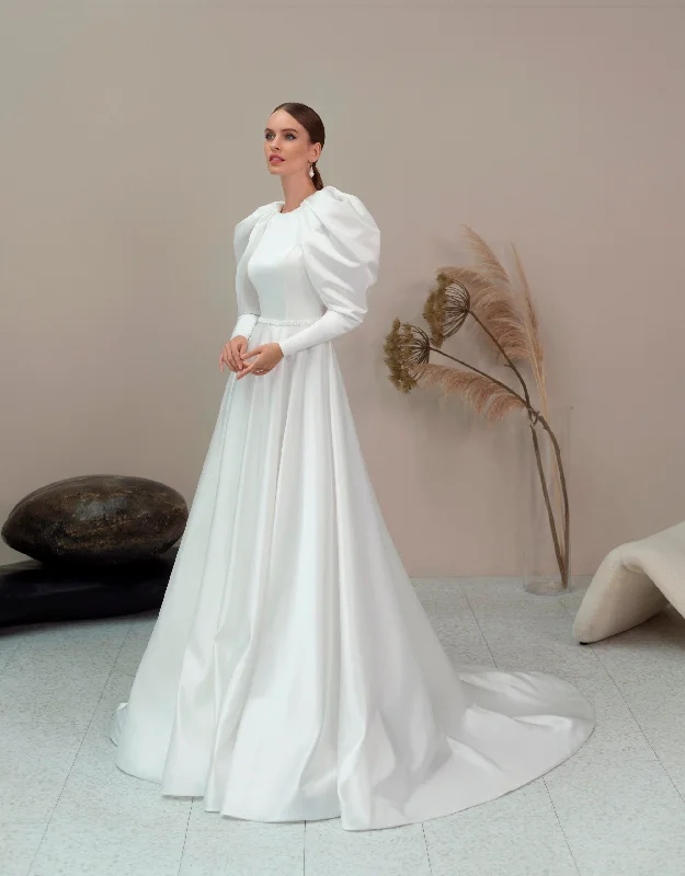 Wedding guest dresses with cut - out details and midi lengthsLong Sleeve Elegant Modest Wedding Dress Wedding guest dresses with cut - out details and midi lengthsLong Sleeve Elegant Modest Wedding Dress