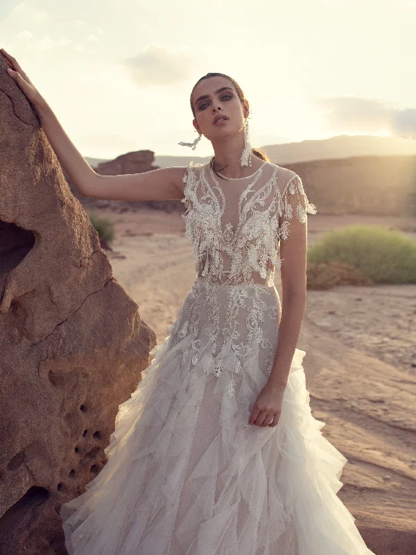 Wedding guest dresses with fringe accents for a bohemian - inspired weddingSleeveless Ruffled Bohemian Wedding Gown Wedding guest dresses with fringe accents for a bohemian - inspired weddingSleeveless Ruffled Bohemian Wedding Gown