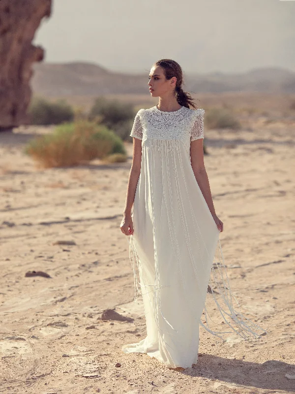 Wedding guest dresses with cut - out details and midi lengthsSpaghetti Strap Wedding Dress with Cape Wedding guest dresses with cut - out details and midi lengthsSpaghetti Strap Wedding Dress with Cape